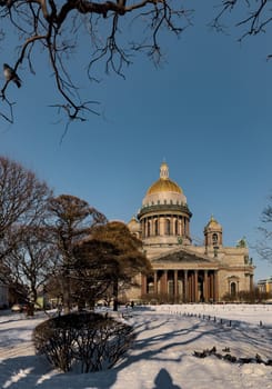 Snow-covered Park in front of St. Isaac's Cathedral in St. Petersburg - Russia in the spring sun. High quality photo