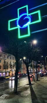 Neon sign of the pharmacy shop at night