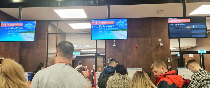 02.03.2024 - Moscow, Russia - Passengers gather at the boarding gates at Sheremetevo international airport