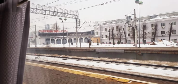 02.03.2024 - Moscow, Russia - Passers by at railway station