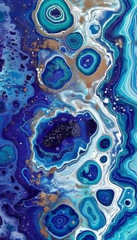 A closeup of an electric blue and white marble texture painting, with a fluid pattern resembling circles and symmetry. The artwork combines elements of water, organisms, aqua, and art paint