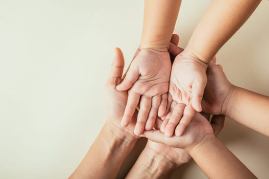 Top view of parents and kid holding empty hands isolated. Family Day celebration symbolizing togetherness support and heritage.