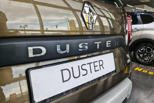 Close-up of the logo of the French car Renault model Duster. Almaty, Kazakhstan - June 06, 2023