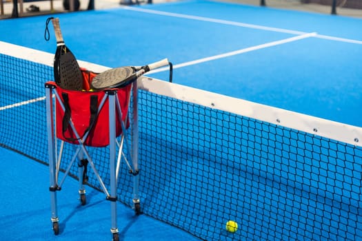 paddle rackets on the playing court. High quality photo