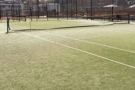 View of multi-functional sports area with tennis courts. High quality photo