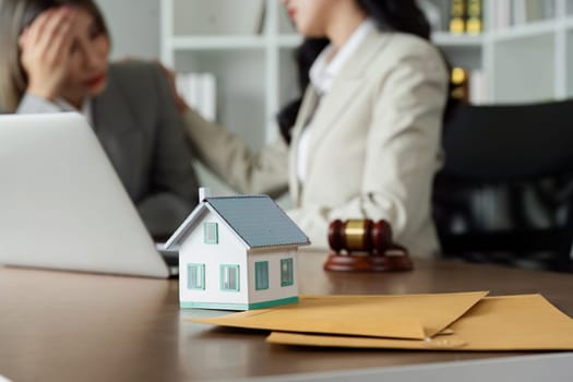 Business clients, real estate broker client stressed after real estate lawsuit.