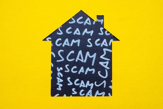 House outline as real estate concept and the words scam.