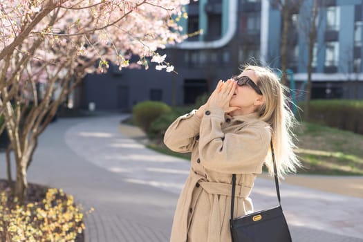 Woman with a nose problem, the impact of pollen. High quality photo