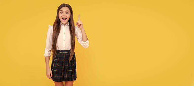 happy kid in school uniform full length inspired with idea on yellow background, idea. Child face, horizontal poster, teenager girl isolated portrait, banner with copy space