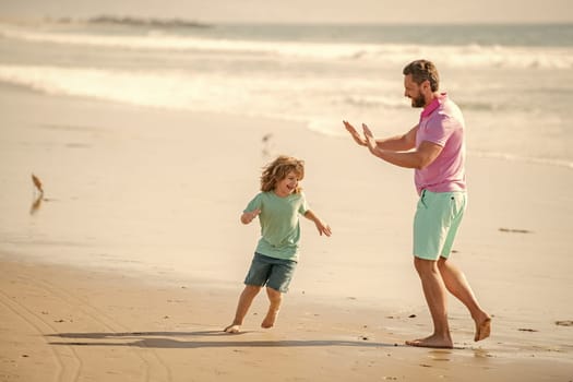 funny kid and dad running on beach in summer vacation for training, togetherness.