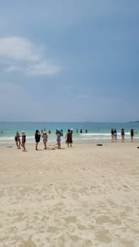 Rayong Koh Samet Thailand 27 March 2024, Chinese tourist on the beach of Koh Samet taking photos and selfies