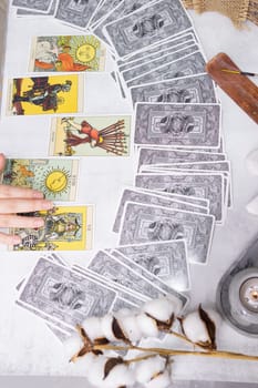 TVER, RUSSIA - FEBRUARY 18, 2024. Tarot cards, Tarot card divination, fortune telling. Occultism, esoteric education