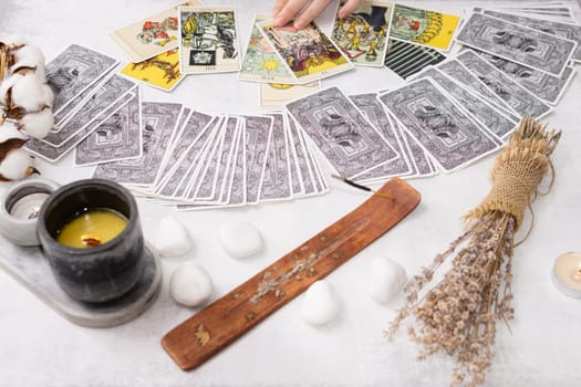 TVER, RUSSIA - FEBRUARY 18, 2024. Tarot cards, Tarot card divination, fortune telling. Occultism, esoteric education