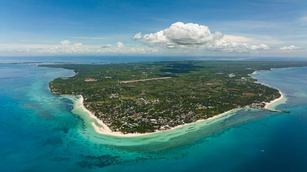 Aerial drone of tropical island with a beautiful beach. Kota Beach. Bantayan island, Philippines.