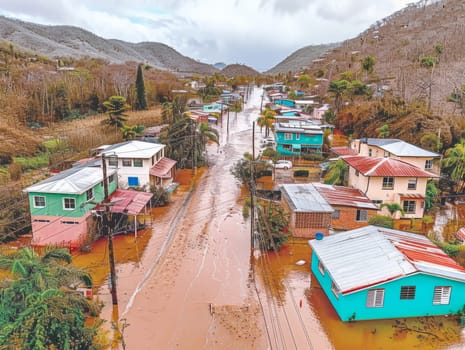 Aerial view of flooding city. Natural disaster damages houses and vehicles. Extreme flood and storm aerial photo. Ai generated.