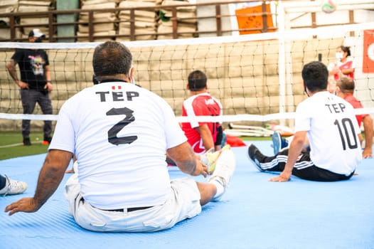 A game of sitting volleyball, unrecognizable people