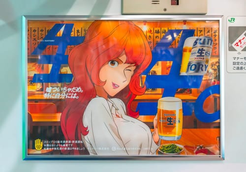 tokyo, japan - apr 2 2024: Japanese advertising poster of Fujiko Mine woman character from anime and manga Lupin the third making a wink while holding a beer mug to promote a new Suntory alchool drink