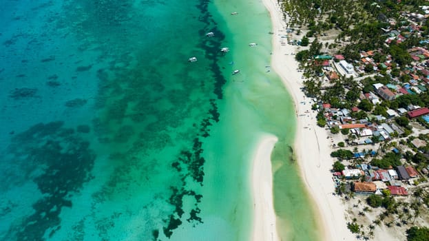 Tropical beach and clear turquoise water in the tropics. Bantayan island, Philippines.