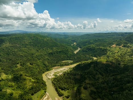 Top view of rural area with agricultural land and rice fields in the tropics. Negros, Philippines