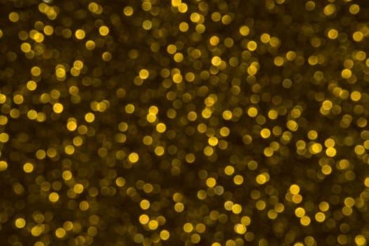 Abstract christmas lights glitter background. christmas gold texture background.