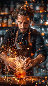 A bartender is pouring a drink into a glass with a blue flame.