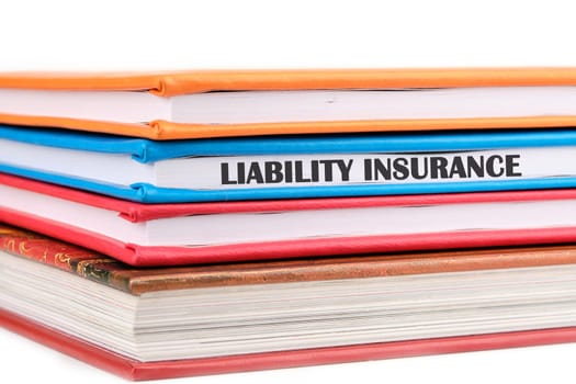 Text Liability Insurance on a notepad on a light background