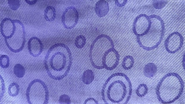 purple background with circles, abstraction on fabric, silk. High quality photo