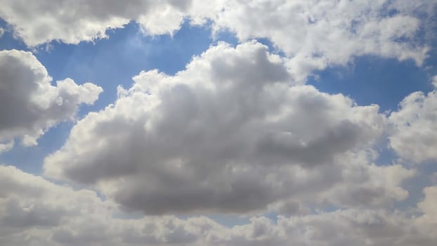 blue sky, white clouds background spring nature weather atmosphere. High quality photo