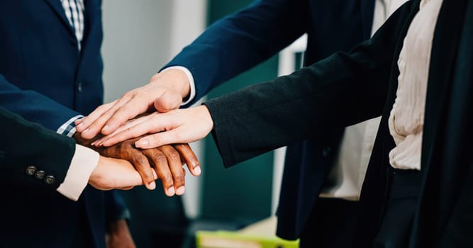 Entrepreneurs and employees unite in a modern office, forming a circle and holding hands in a symbolic act of teamwork and unity. diversity and communication is an inspiring example of togetherness.