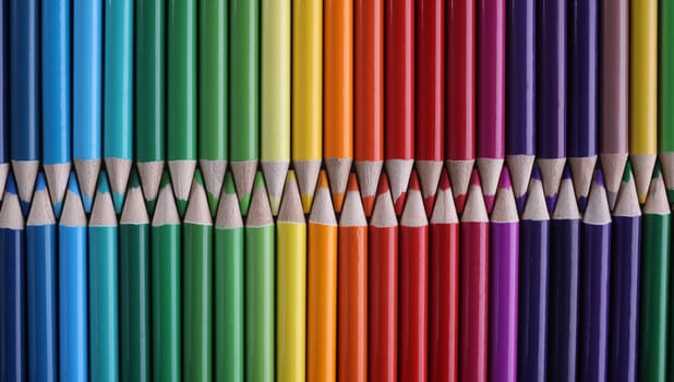 Set of colored pastel pencils in row of multicolor in form of closed zipper. Selection of colors and shades in painting concept