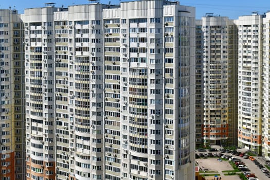 Khimki, Russia - May 10. 2018. Cityscape with the residential buildings, cars and road