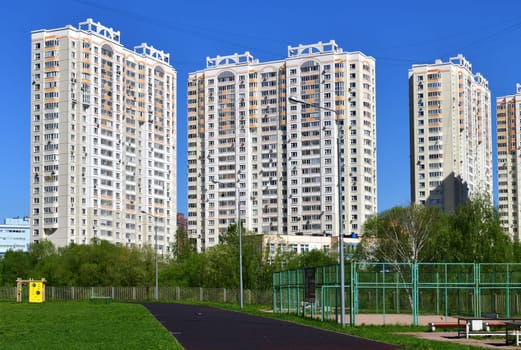 City houses surrounded by trees in the Moscow, Russia