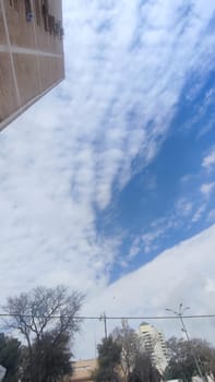 Blue gray light sky nature white clouds whether background, sun face . High quality photo