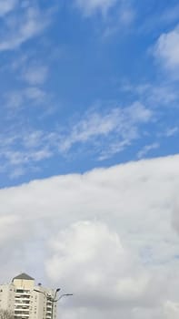 Blue gray light sky nature white clouds whether background, sun face . High quality photo