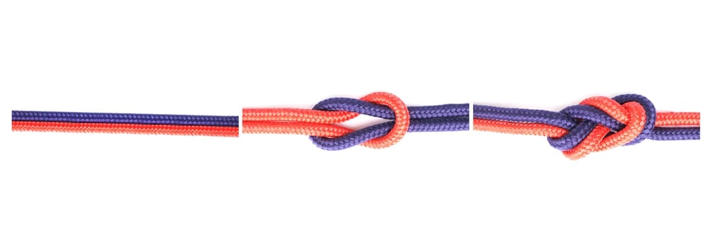Knot, cable or how to tie ropes on white background in studio for security or instruction steps. Material, safety and color design for cords technique, tools or learning for survival guide lesson.