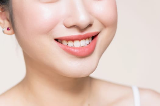 Cropped close up photo of beautiful woman's lips with shape correction