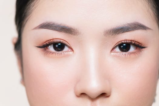Close-up macro of beautiful female eye with perfect shape eyebrows