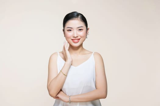 Young perfect woman face with clear skin, skincare concept