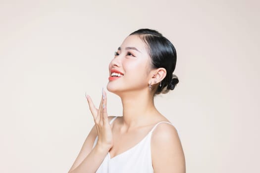 Woman face profile side view. Chin lift pointing with index finger