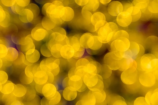 Abstract golden color lights chrismas background. de-focused - image