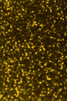 Abstract christmas lights glitter background. christmas gold texture background.