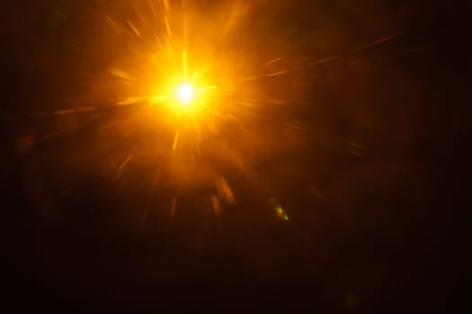 Abstract imitation sun starlight distant galaxy on a black background. -image