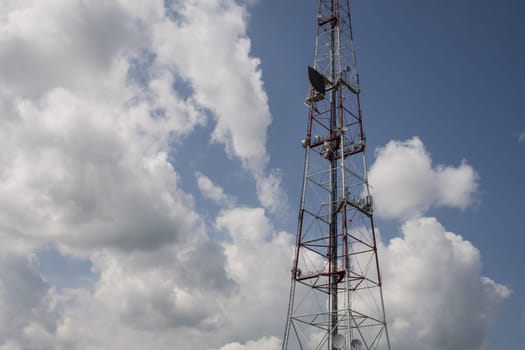 Telecommunication towers include of radio microwave and television antenna system with cloud blue sky .