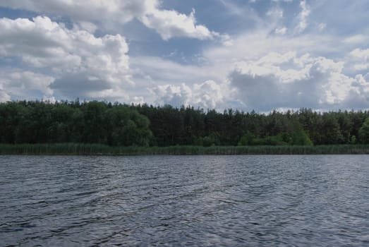 Beautiful landscape. The sky is in the clouds.River in Ukraine, Southern Bug, Vinnitsa region, village of Chernyatki.