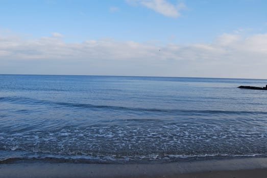 Black Sea. Sandy beach. Quiet water.