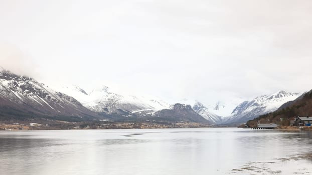 The view from the Andalsnes waterfront looking towards Isfjorden, Norway.  Isfjorden is a small village in the Rauma Valley on the shores of Romsdalsfjord.
