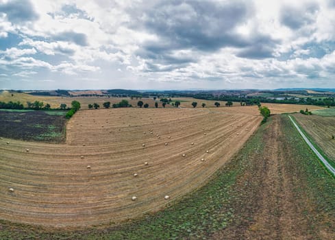 Aerial view of a rural landscape with a field at an angle