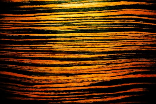 Zebrawood cladding. Wood texture. Orange.Furniture products are covered with this veneer.
