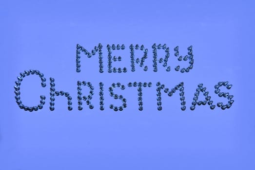 Merry Christmas greeting inscription. In creative execution.