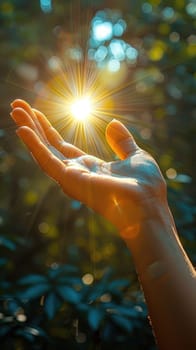A person extending their hand with the sun shining brightly in the background.